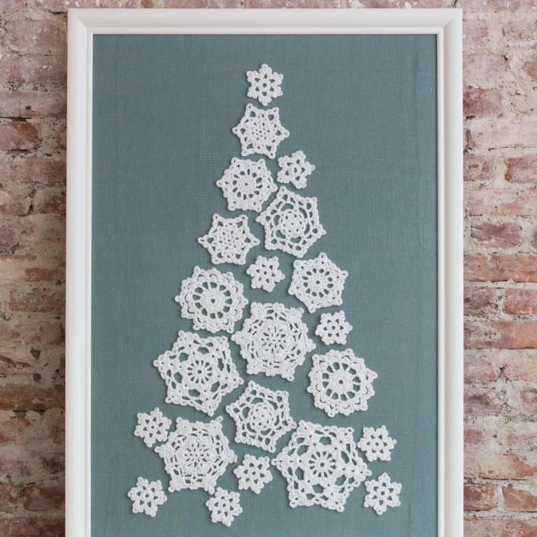 Crochet snowflake tree pattern showcasing intricate designs for winter decor.