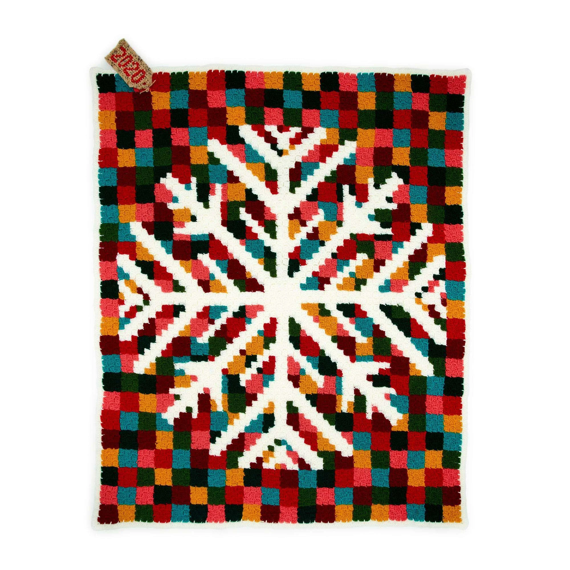 Snowflake C2C crochet blanket pattern showcasing intricate design and texture